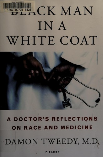 Black man in a white coat